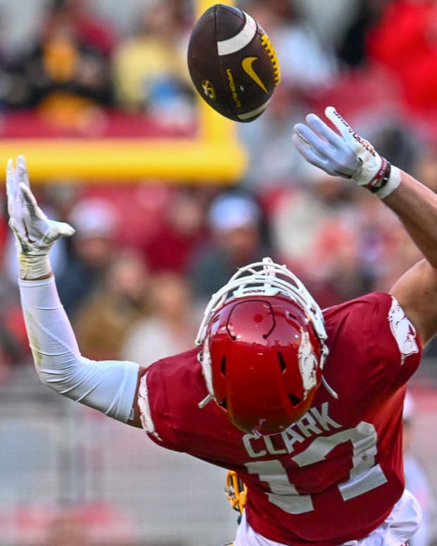 Razorbacks cornerback Hudson Clark knocks down a pass against Missouri